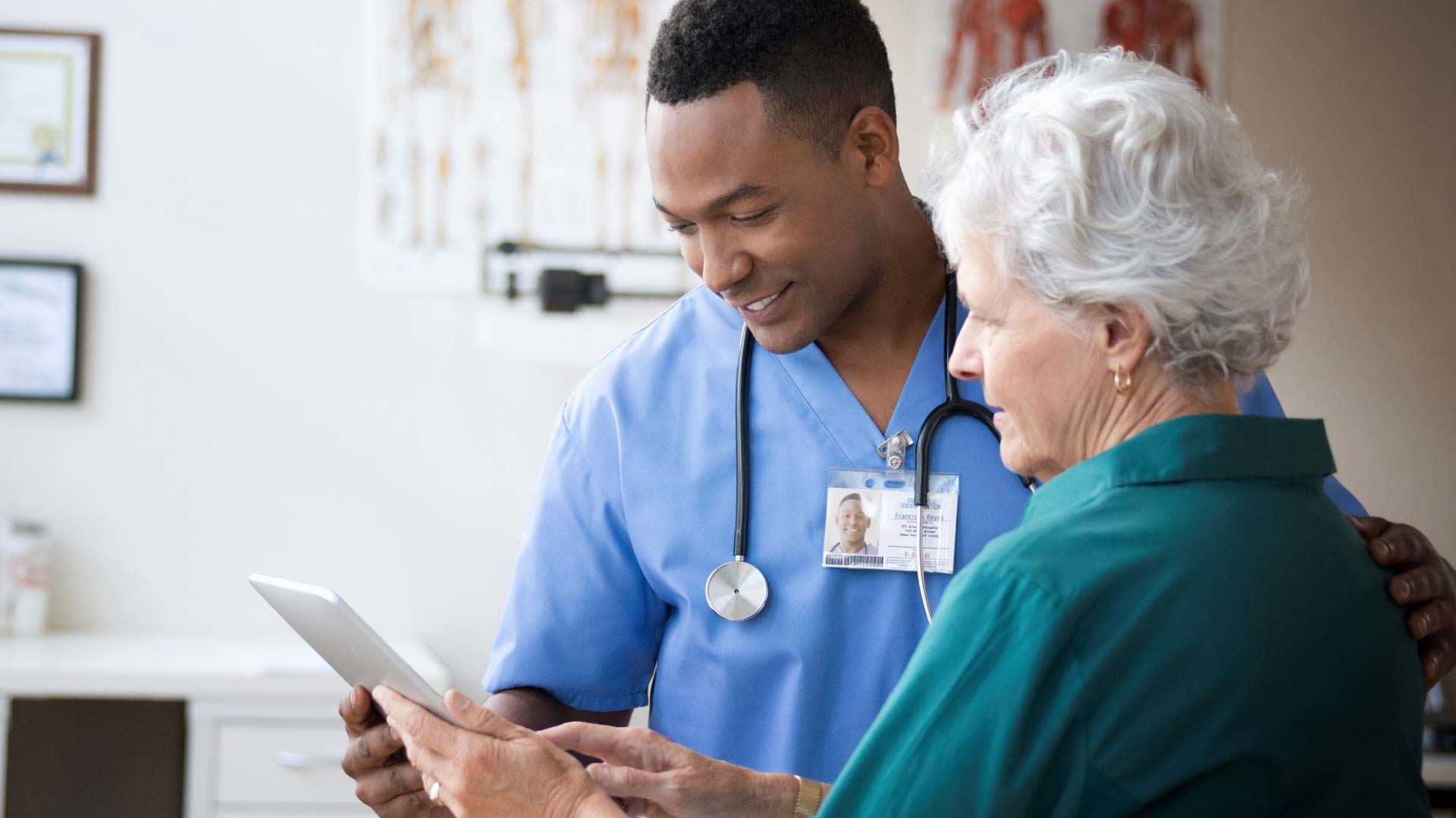 Why Interoperability Progress is Significant for Nursing_nurse talking to patient
